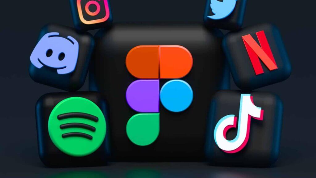 3D icons of Figma, Spotify, TikTok, Netflix, Discord, Instagram, and Twitter on black cubes