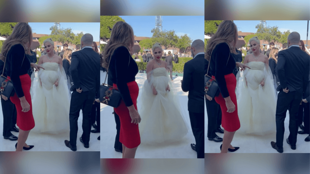 Pregnant Billie Eilish in a strapless white gown talking to guests at an outdoor event.