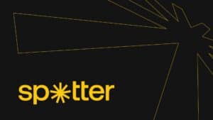 Spotter logo with a yellow asterisk on a black background and radiating yellow lines