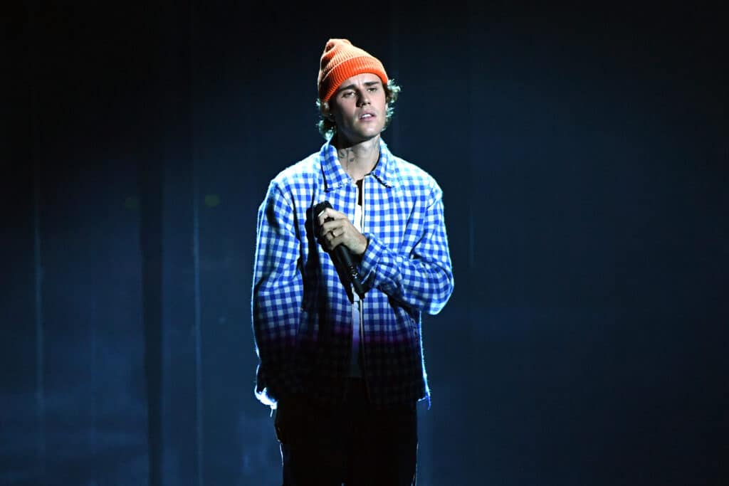 In this image released on November 22, Justin Bieber performs onstage for the 2020 American Music Awards at Microsoft Theater on November 22, 2020 in Los Angeles, California.
