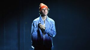 In this image released on November 22, Justin Bieber performs onstage for the 2020 American Music Awards at Microsoft Theater on November 22, 2020 in Los Angeles, California.