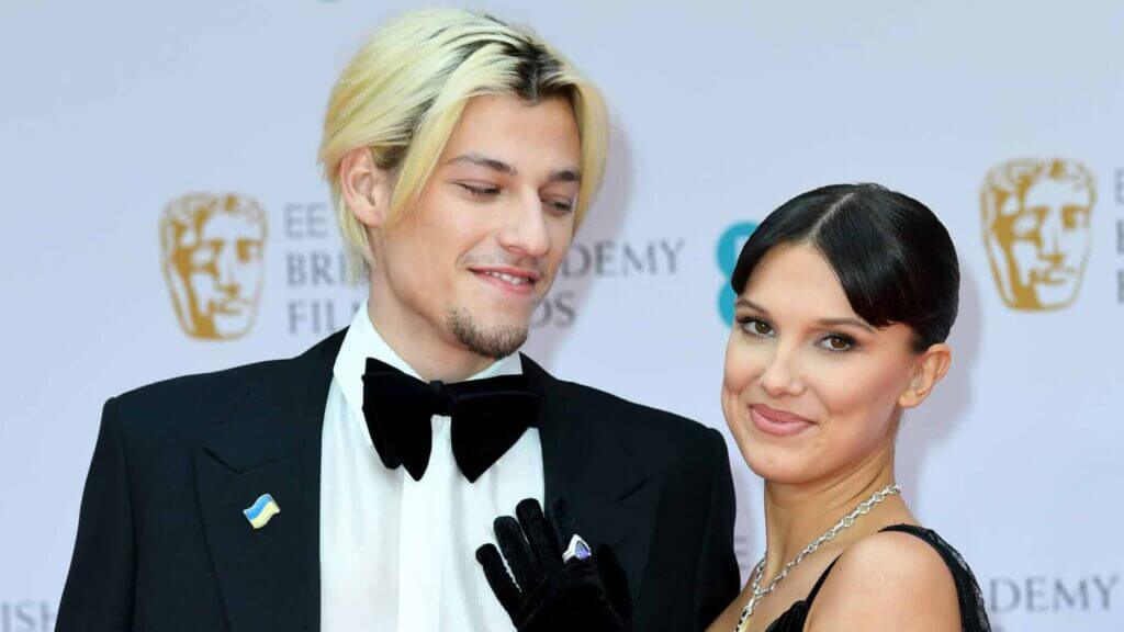 Jake Bongiovi and Millie Bobby Brown attend the EE British Academy Film Awards 2022 at Royal Albert Hall on March 13, 2022 in London, England.