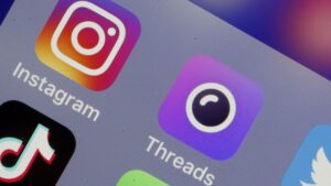 PARIS, FRANCE - OCTOBER 07: In this photo illustration, social media, Instagram and Threads application logos are displayed on the screen of a smartphone on October 07, 2019 in Paris, France. The social network Instagram launched last week Threads its new application to promote the constant and intimate sharing between users and their closest friends. This Snapchat-inspired email app complements the popular Instagram image sharing service.