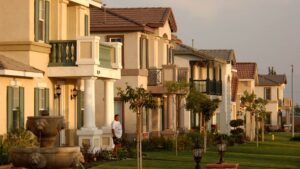 ONTARIO, CA - MAY 23: New houses line the street in the Inland Empire, the area east of Los Angeles, in Riverside and San Bernardino Counties, May 23, 2003 in Ontario, California. The high cost of housing in the Los Angeles area has many Angelinos opting for lower priced new homes in the counties to the east and commuting long distances on often-jammed freeways to get their jobs in L.A. Angelinos reportedly have the nation's longest cummutes and worst traffic. A Census Bureau survey released May 19 reports that about 782 people moved to the Los Angeles-Long Beach metropolitan area, already the nation's most populated at nearly 9.5 million, each day in 2001. The 2001 total was more than 285,000.