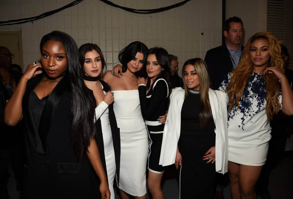 auregui, Camila Cabello, Ally Brooke Hernandez, Dinah Jane of Fifth Harmony pose with Selena Gomez at Z100's Jingle Ball 2015 at Madison Square Garden on December 11, 2015 in New York City.
