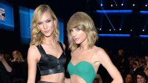 Karlie Kloss and Taylor Swift attend the 2014 American Music Awards at Nokia Theatre L.A. Live on November 23, 2014 in Los Angeles, California.