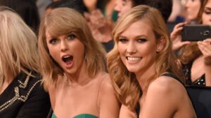 Karlie Kloss and Taylor Swift attend the 2014 American Music Awards at Nokia Theatre L.A. Live on November 23, 2014 in Los Angeles, California.