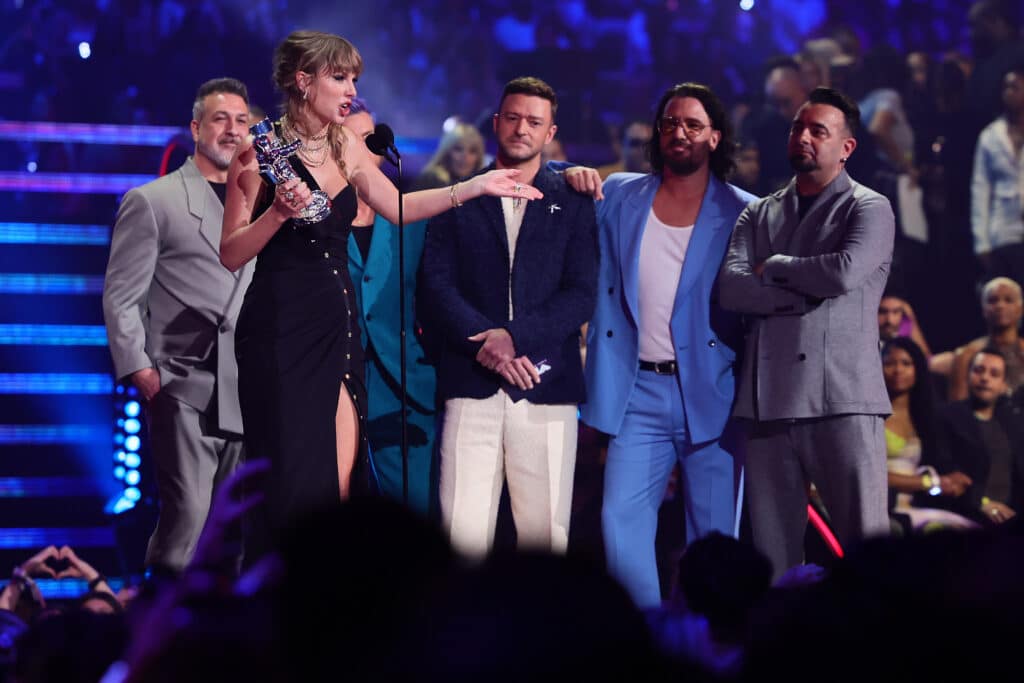 Taylor Swift (2nd L) accepts the Best Pop award for "Anti-Hero" from (from L) Joey Fatone, Lance Bass, Justin Timberlake, JC Chasez, and Chris Kirkpatrick of *NSYNC onstage the 2023 MTV Video Music Awards at Prudential Center on September 12, 2023 in Newark, New Jersey.