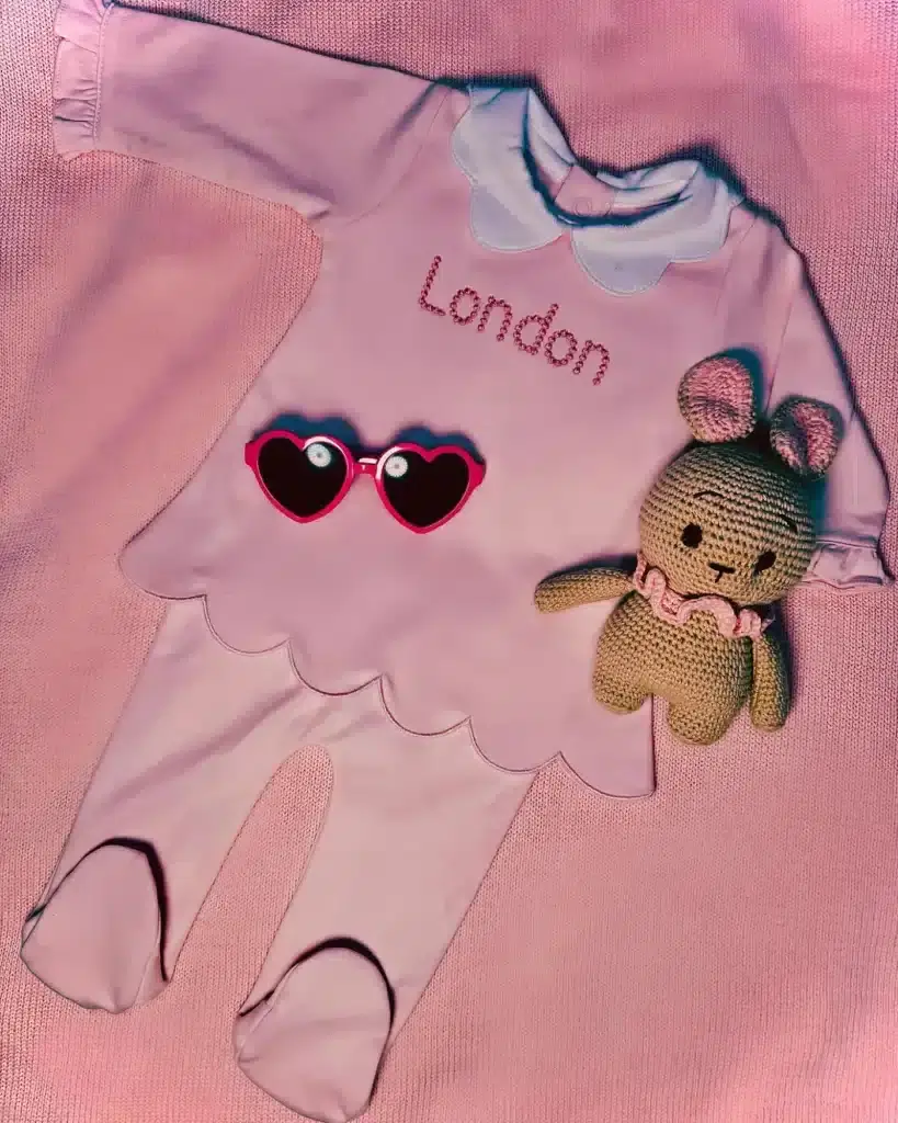 Paris Hilton shares baby clothes photos on social media.