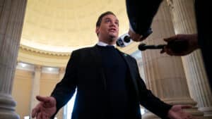 Representative George Santos, a Republican from New York, speaks with members of the media on Capitol Hill in Washington, DC, US, on Friday, Dec. 1, 2023. The US House expelled Santos, ending a brief but sensational turn in national politics by a serial fabulist now under criminal indictment for fraud, theft and lying to the government.