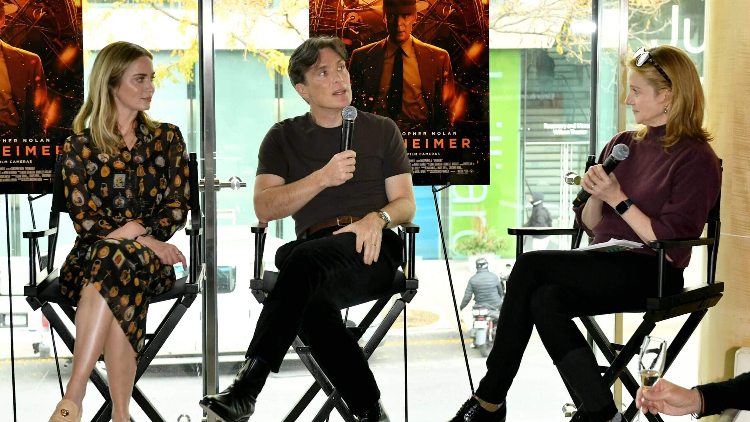 NEW YORK, NEW YORK - DECEMBER 05: (L-R) Emily Blunt, Cillian Murphy, and Laura Linney speak onstage as Universal Pictures presents an Oppenheimer special screening At The Walter Reade Theater on December 05, 2023 in New York City.