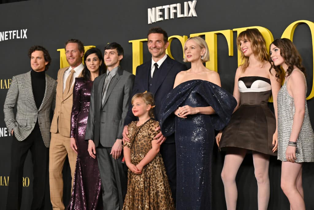 Matt Bomer, Brian Klugman, Sarah Silverman, Gideon Glick, Bradley Cooper, Lea De Seine Shayk Cooper, Carey Mulligan, Maya Hawke, and Alexa Swinton attend Netflix's "Maestro" Los Angeles Photo Call at Academy Museum of Motion Pictures on December 12, 2023 in Los Angeles, California.