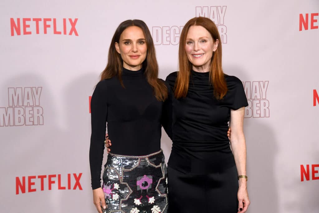 Natalie Portman and Julianne Moore attend Netflix's "May December" Los Angeles Photo Call at Four Seasons Hotel Los Angeles at Beverly Hills on November 17, 2023 in Los Angeles, California. 