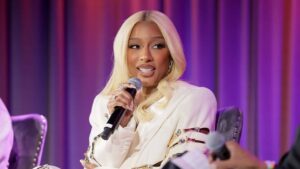 Victoria Monét speaks onstage at A Conversation with Victoria Monét with Special Guest D'Mile Moderated by Jimmy Jam at The GRAMMY Museum on December 13, 2023 in Los Angeles, California.