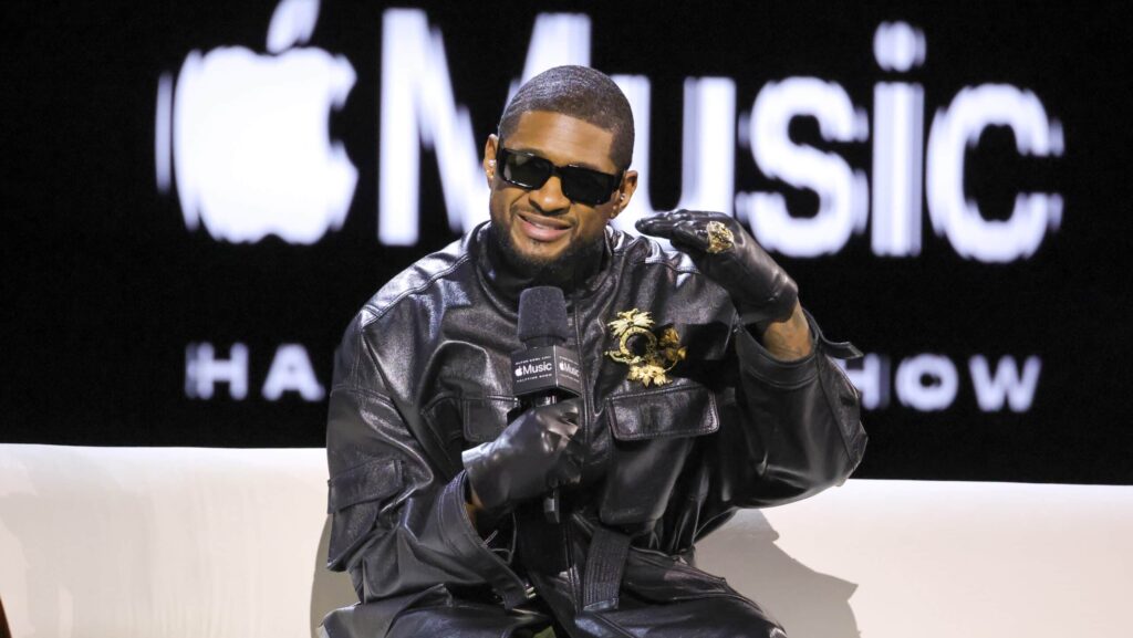 Usher speaks onstage during the Super Bowl LVIII Pregame & Apple Music Super Bowl LVIII Halftime Show press conference at the Mandalay Bay Convention Center on February 08, 2024 in Las Vegas, Nevada.