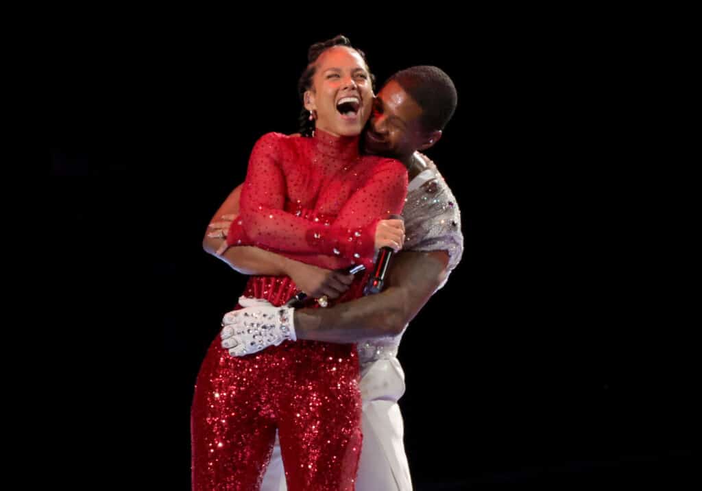 Alicia Keys and Usher perform onstage during the Apple Music Super Bowl LVIII Halftime Show at Allegiant Stadium on February 11, 2024 in Las Vegas, Nevada