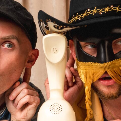 Orville Peck pictured with Katya Zamolodchikova on Grindr's podcast 'Who's The Asshole?"