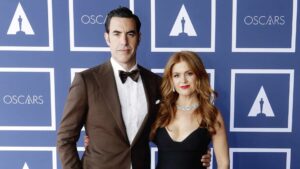 Sacha Baron Cohen (L) and Isla Fisher attend a screening of the Oscars on Monday, April 26, 2021 in Sydney, Australia.
