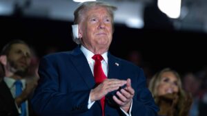 Former US President Donald J Trump makes an early appearance on the first night of the Republican National Convention in Milwaukee, Wisconsin at the Fiserv Forum on Monday, July 15, 2024. This is Trump’s first appearance since a rally in Pennsylvania, where he sustained injuries from an alleged bullet grazing his ear. Trump also named United States Senator JD Vance (Republican of Ohio) as his Vice Presidential running mate.