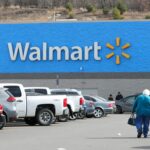 A Walmart logo seen from the parking lot of its store in Bloomsburg.