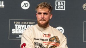 Jake Paul speaks during Weigh-in ceremony leading to Katie Taylor and Amanda Serrano fight at Hulu Theater at MSG. This will be the first women's boxing fight to headline Madison Square Garden in history.