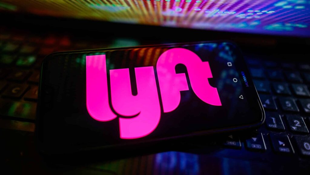 In this photo illustration a Lyft logo is displayed on a smartphone.