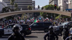 Anti-ICE protesters face off with law enforcement following the ''No Kings'' protest in downtown Los Angeles, United States, on June 14, 2025.