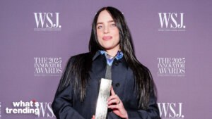 Billie Eilish holding an award at The 2025 Innovator Awards by The Wall Street Journal Magazine.